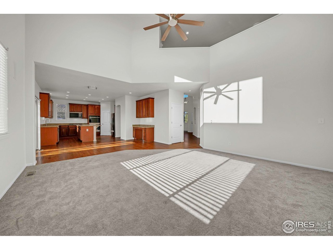 1936 Alpine Drive Erie, CO 80516 - Photo 17 of 47 a view of a bedroom with furniture and windows