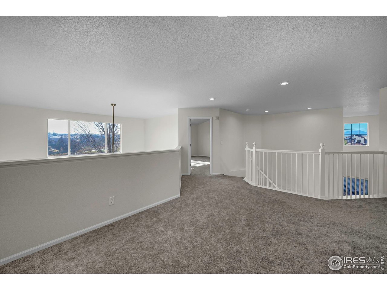 1936 Alpine Drive Erie, CO 80516 - Photo 21 of 47 a view of an empty room with a window