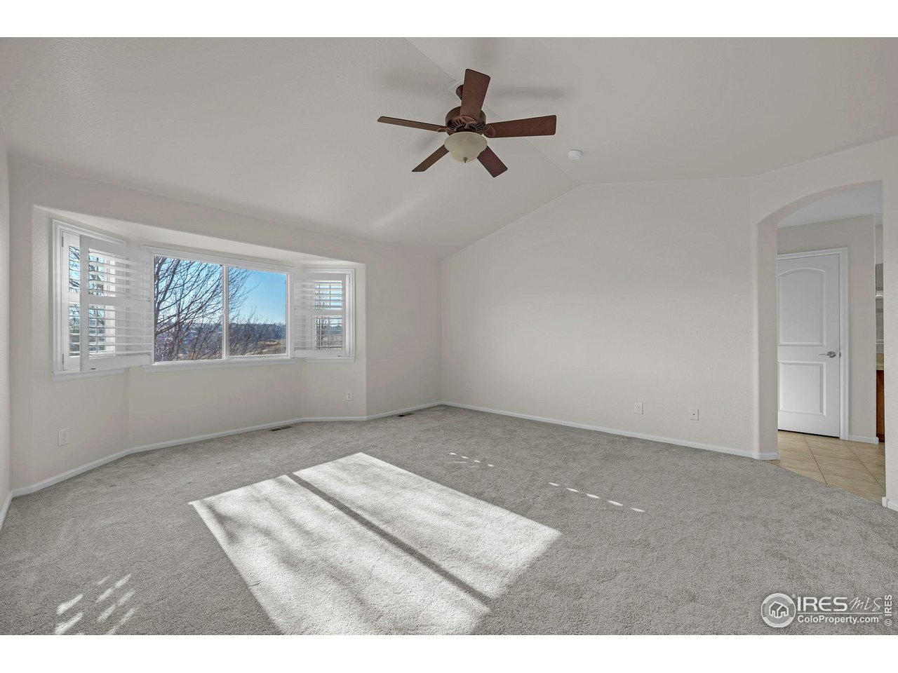 1936 Alpine Drive Erie, CO 80516 - Photo 23 of 47 a view of empty room with windows