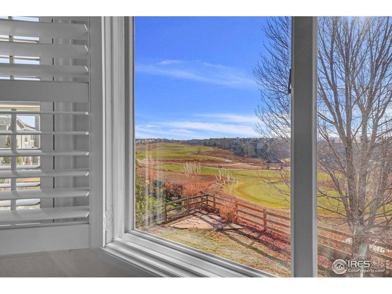 1936 Alpine Drive Erie, CO 80516 - Photo 24 of 47 a view of a room and wooden floor