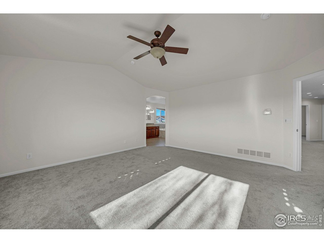 1936 Alpine Drive Erie, CO 80516 - Photo 25 of 47 a view of empty room with ceiling fan