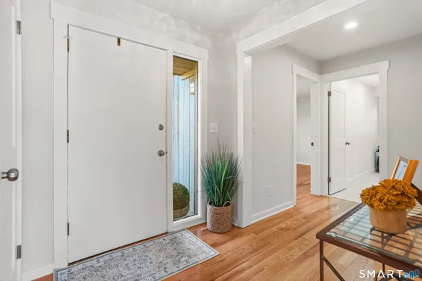 a view of a livingroom with wooden floor