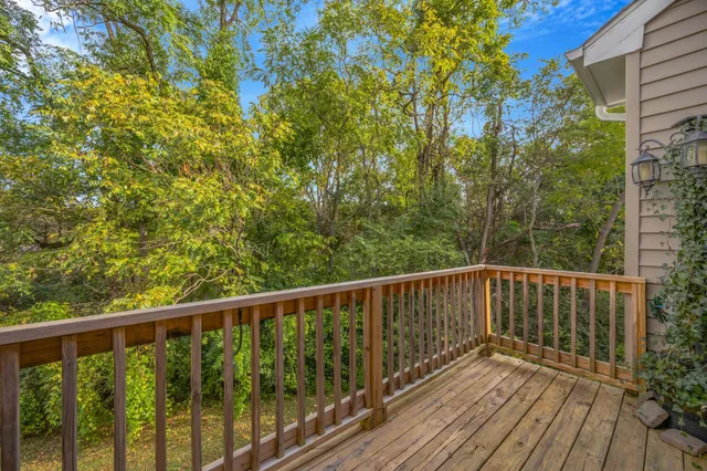 a view of a house with a yard porch and sitting area