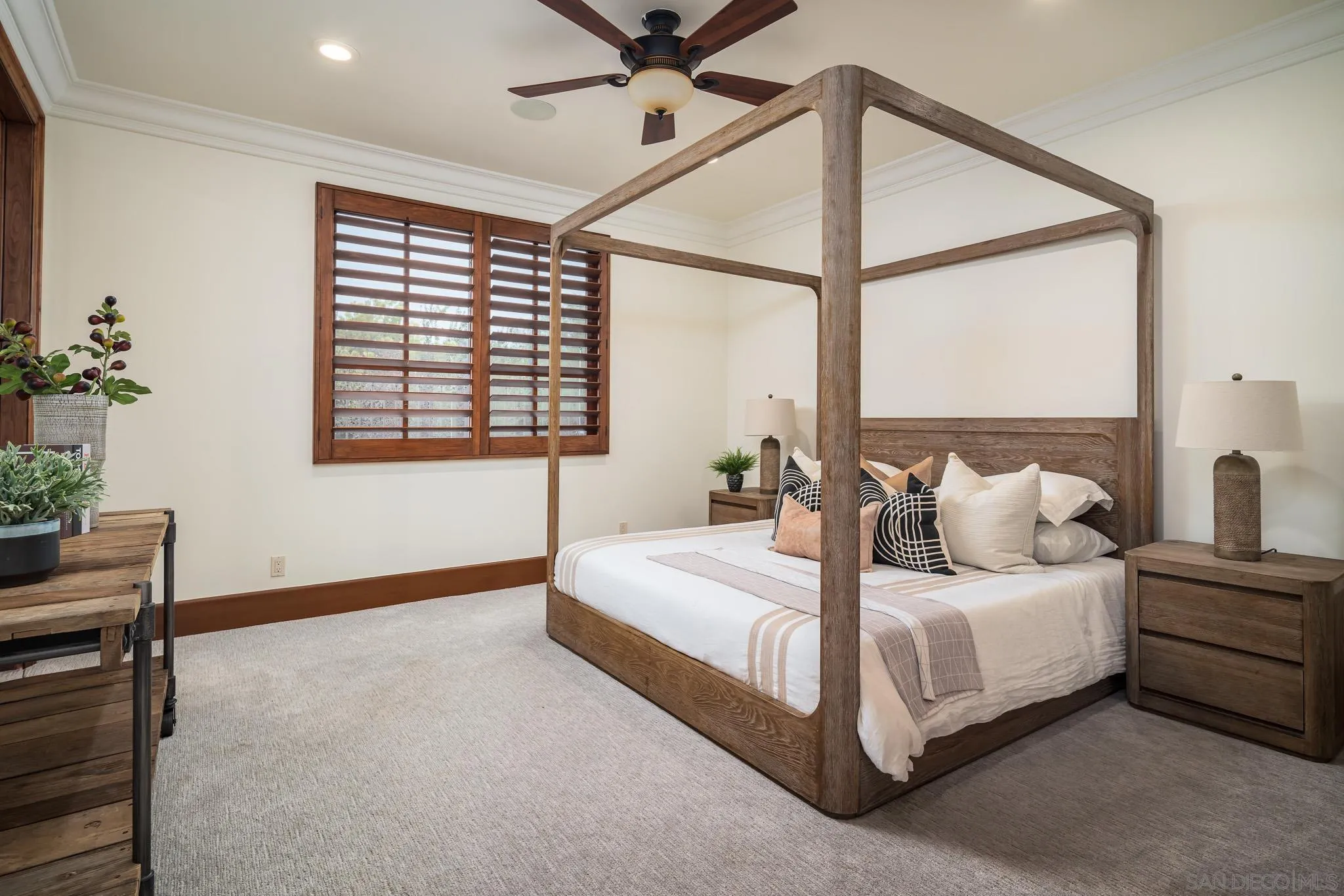 8415 Run Of The Knolls Court San Diego, CA 92127 - Photo 25 of 39 a bedroom with double bed and a window