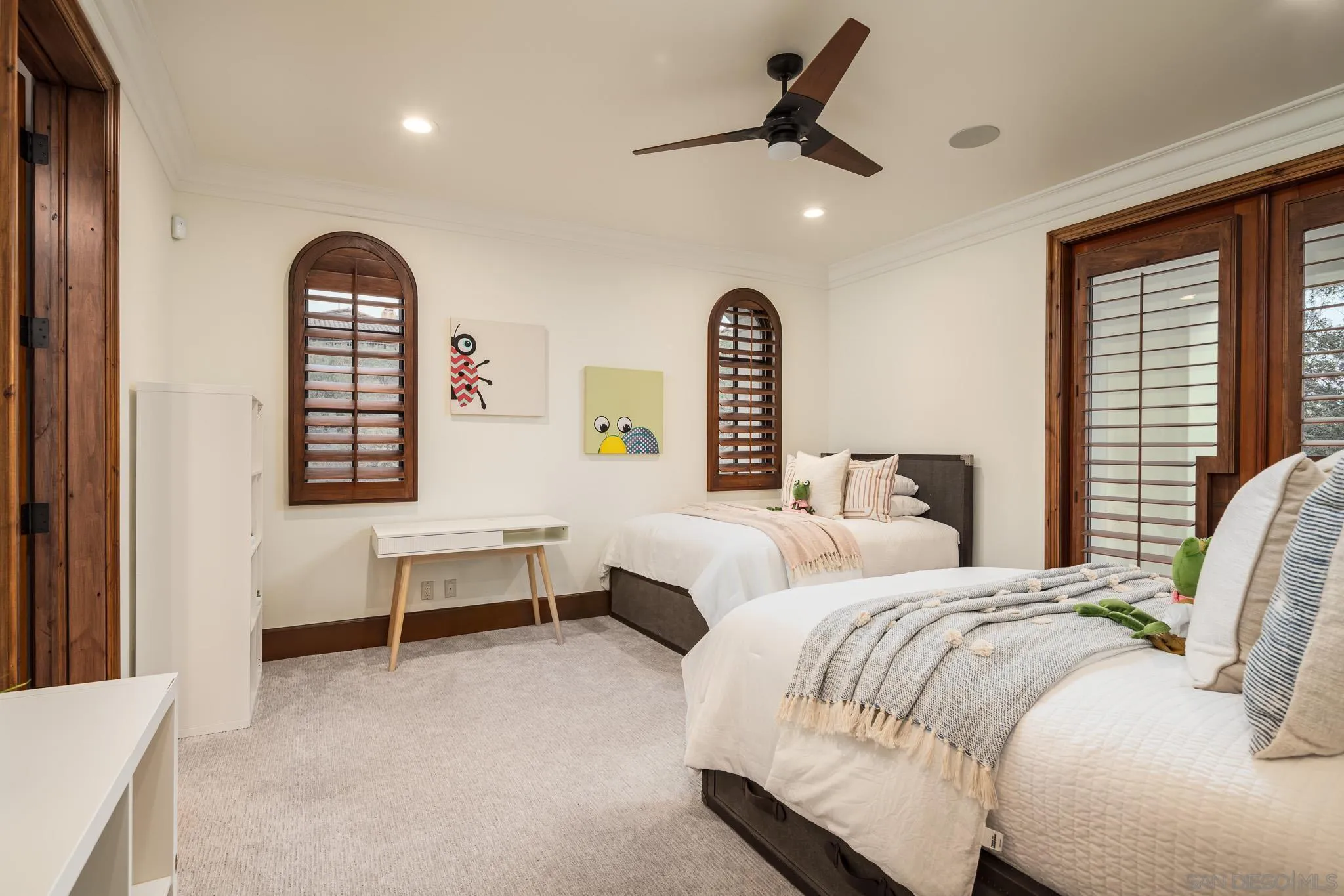 8415 Run Of The Knolls Court San Diego, CA 92127 - Photo 29 of 39 a bedroom with a bed and a window