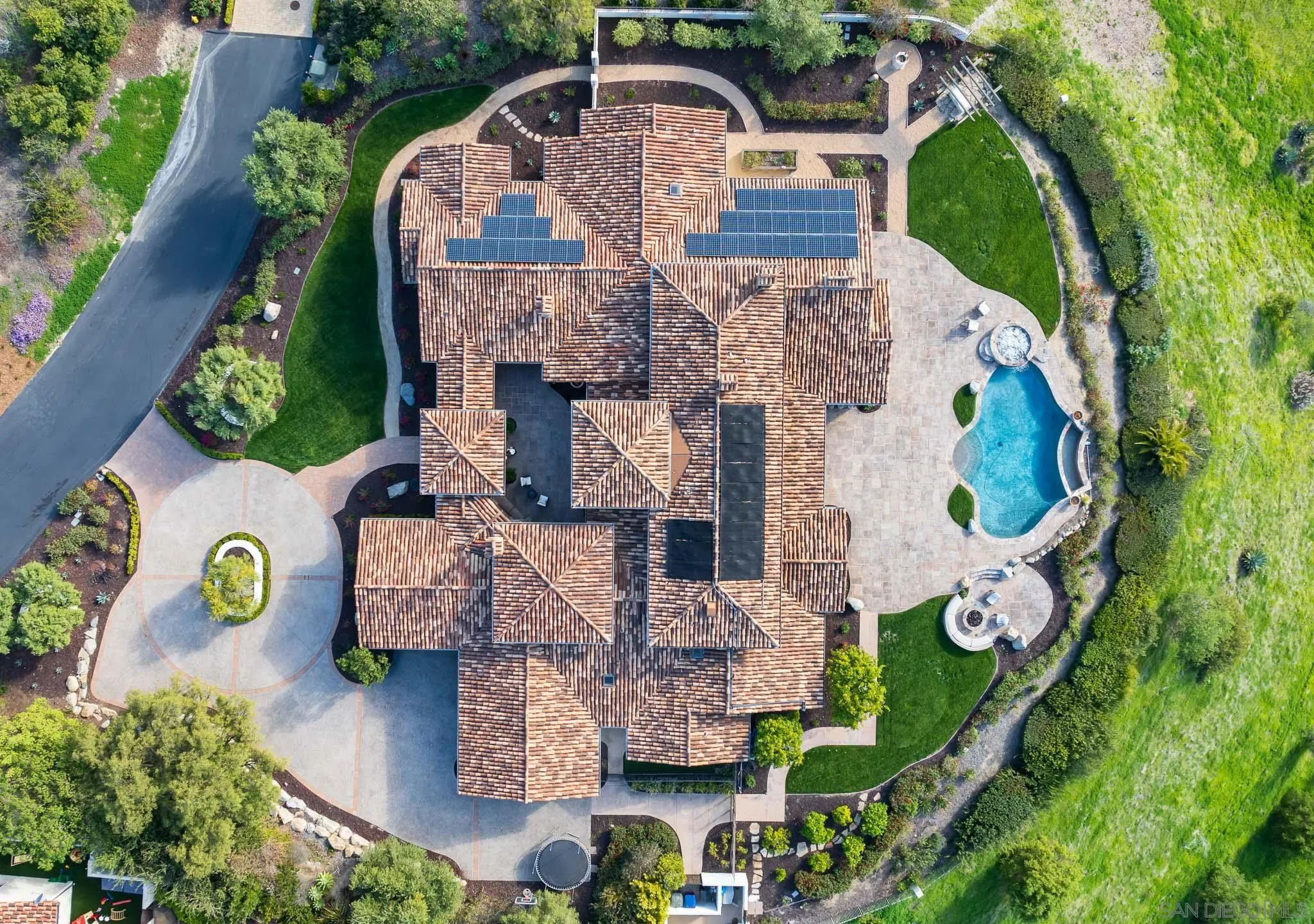 8415 Run Of The Knolls Court San Diego, CA 92127 - Photo 35 of 39 an aerial view of a house with a yard and large trees