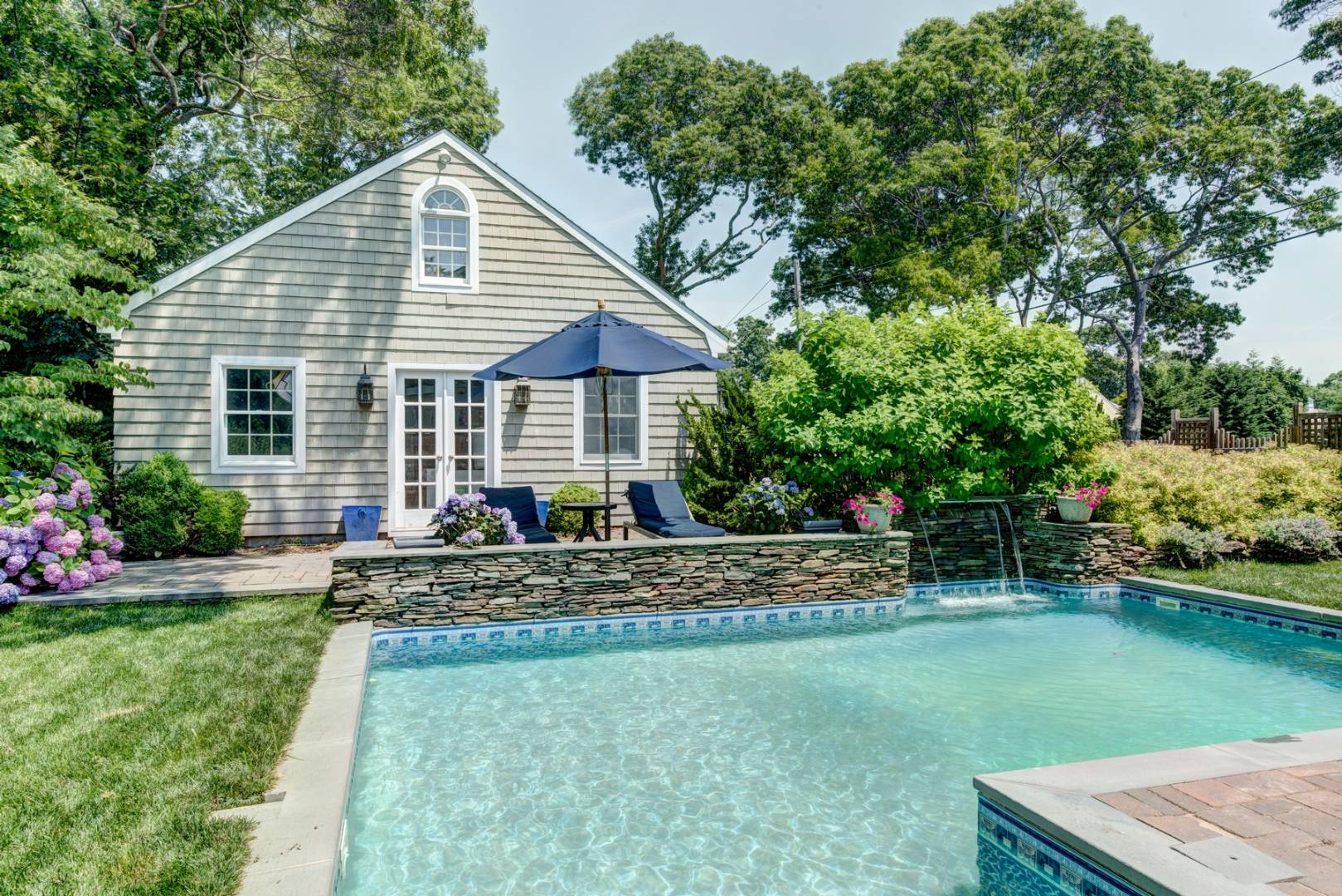 26 Wireless Road East Hampton, NY 11937 - Photo 12 of 13 a view of a house with a yard