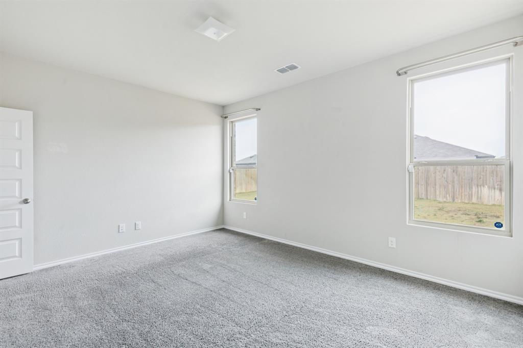 969 Ravenwood Lane Van Alstyne, TX 75495 - Photo 14 of 27 a view of an empty room with a window