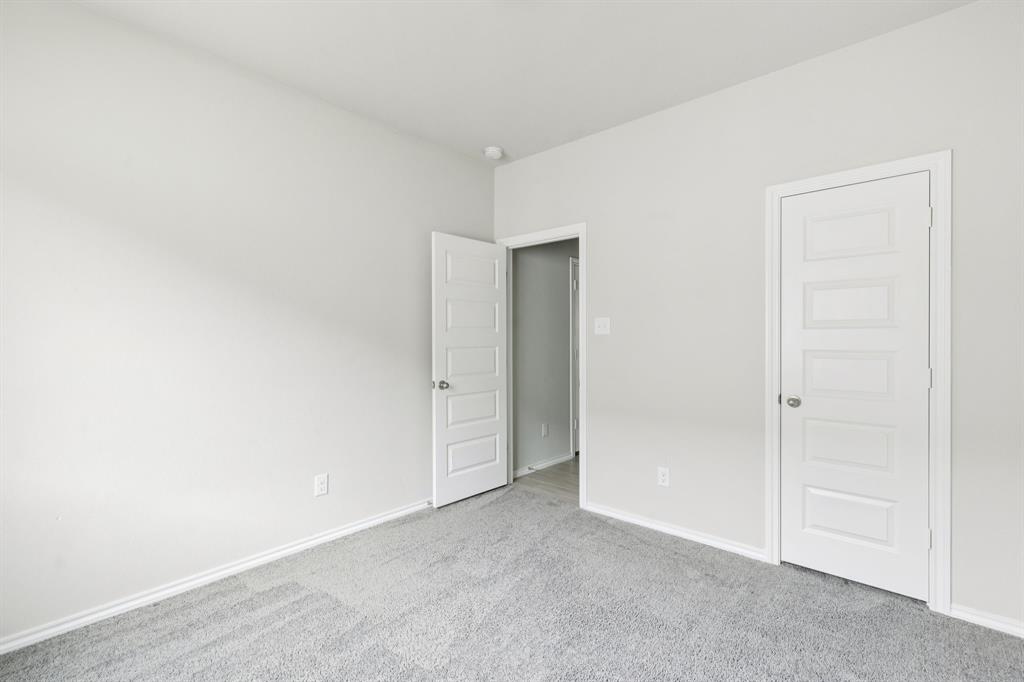 969 Ravenwood Lane Van Alstyne, TX 75495 - Photo 20 of 27 a view of an empty room