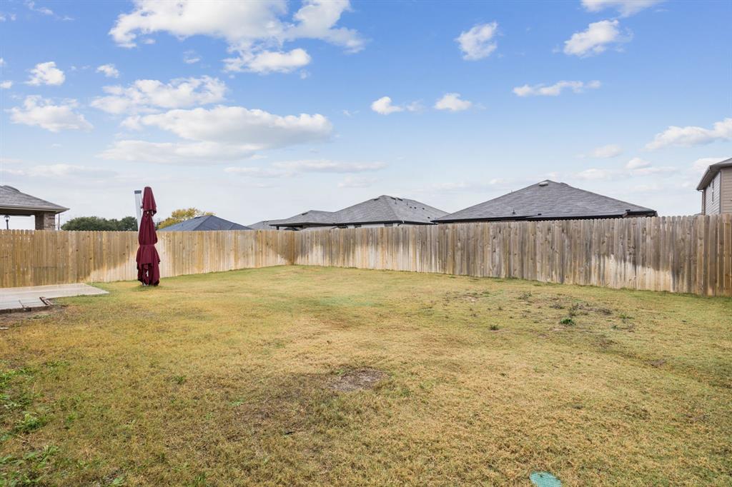 969 Ravenwood Lane Van Alstyne, TX 75495 - Photo 22 of 27 a view of an outdoor space and yard