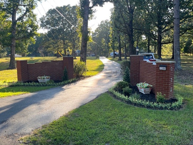 1386 Chisholm Road Cypress Inn, TN 38452 - Photo 9 of 58 a view of a backyard with swimming pool