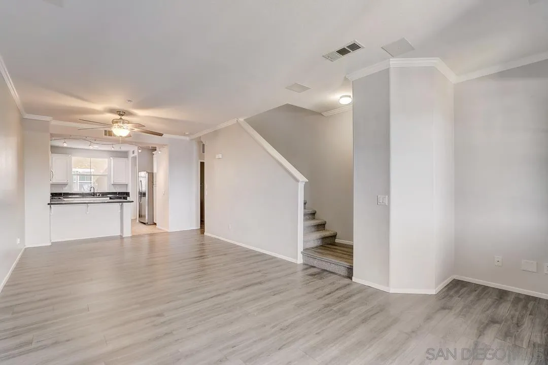 10225 Daybreak Lane, Unit 2 Santee, CA 92071 - Photo 12 of 20 a view of kitchen with wooden floor and electronic appliances