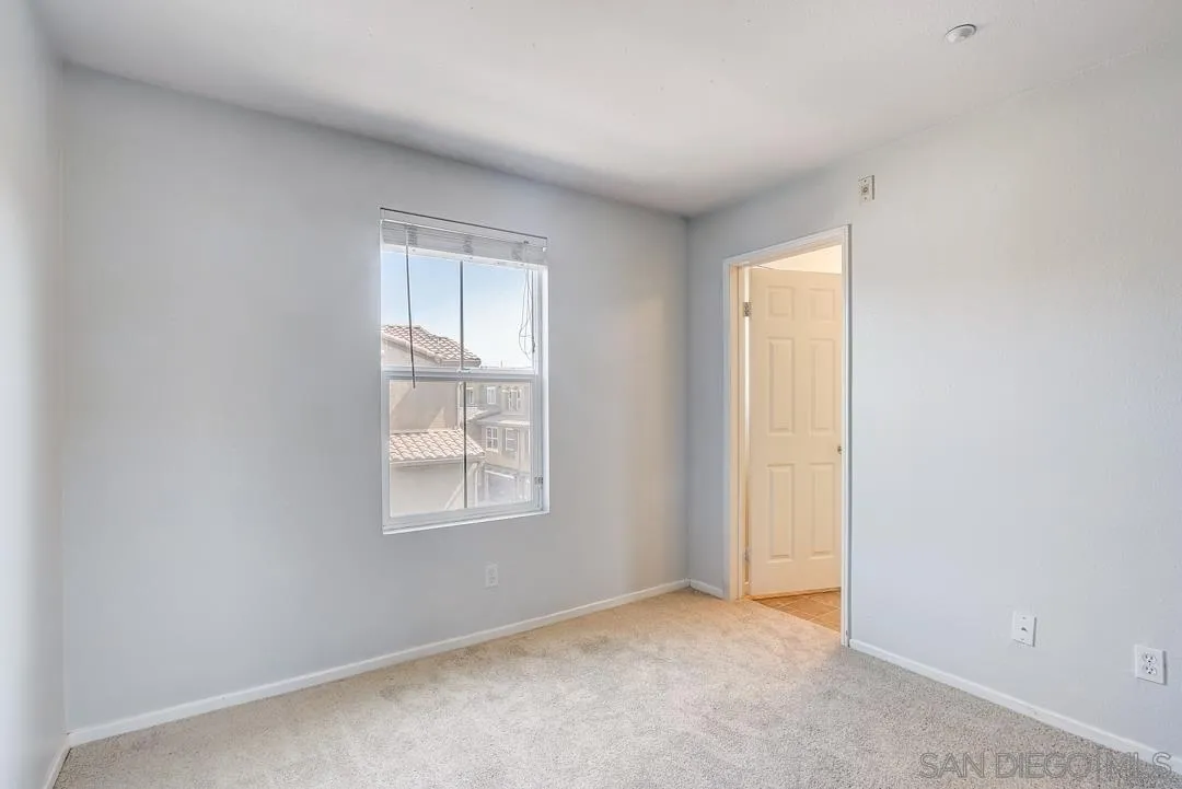 10225 Daybreak Lane, Unit 2 Santee, CA 92071 - Photo 15 of 20 an empty room with windows