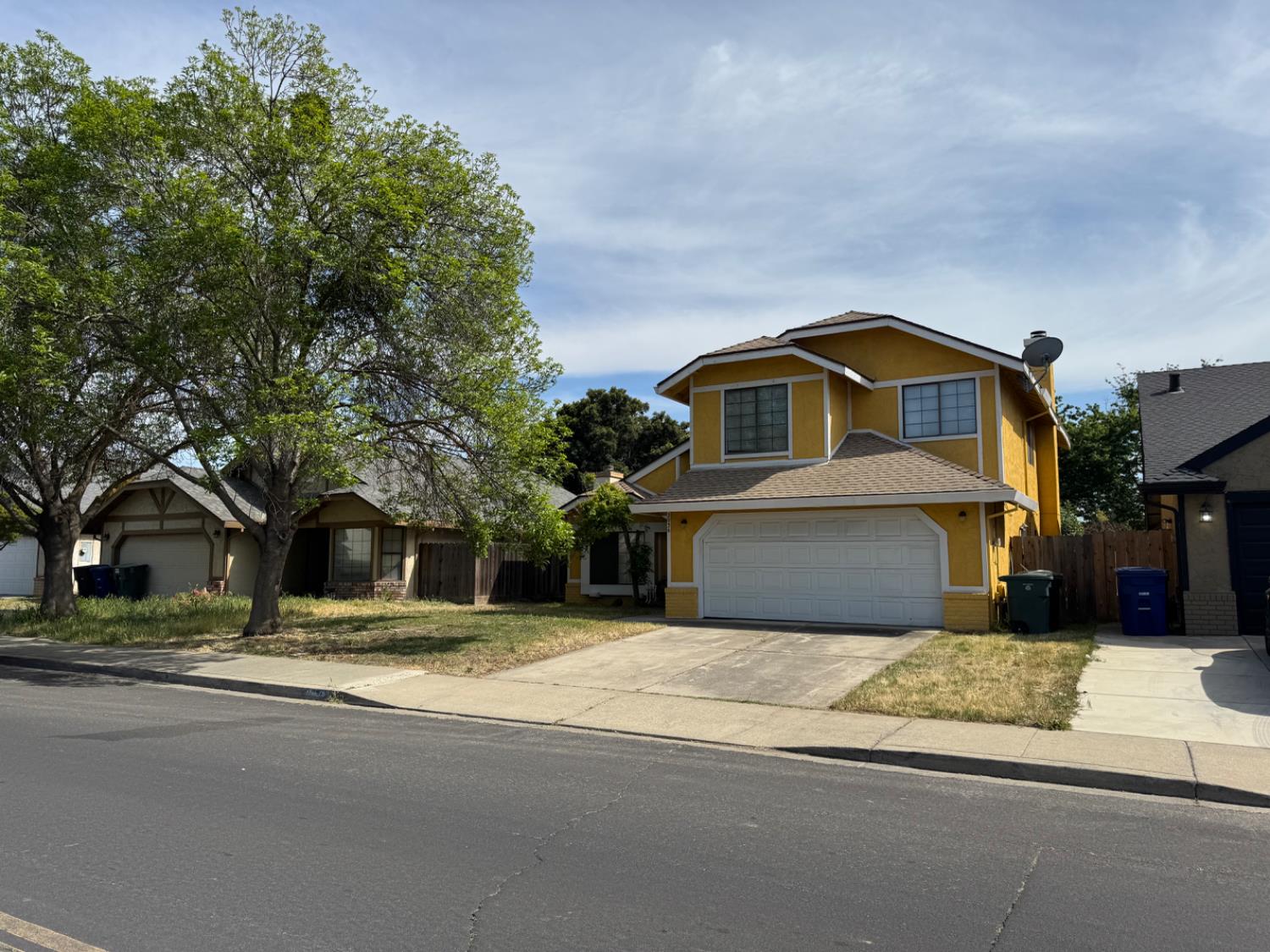 2036 Sheldon Drive Modesto, CA 95350 - Photo 2 of 2 a front view of a house with a yard