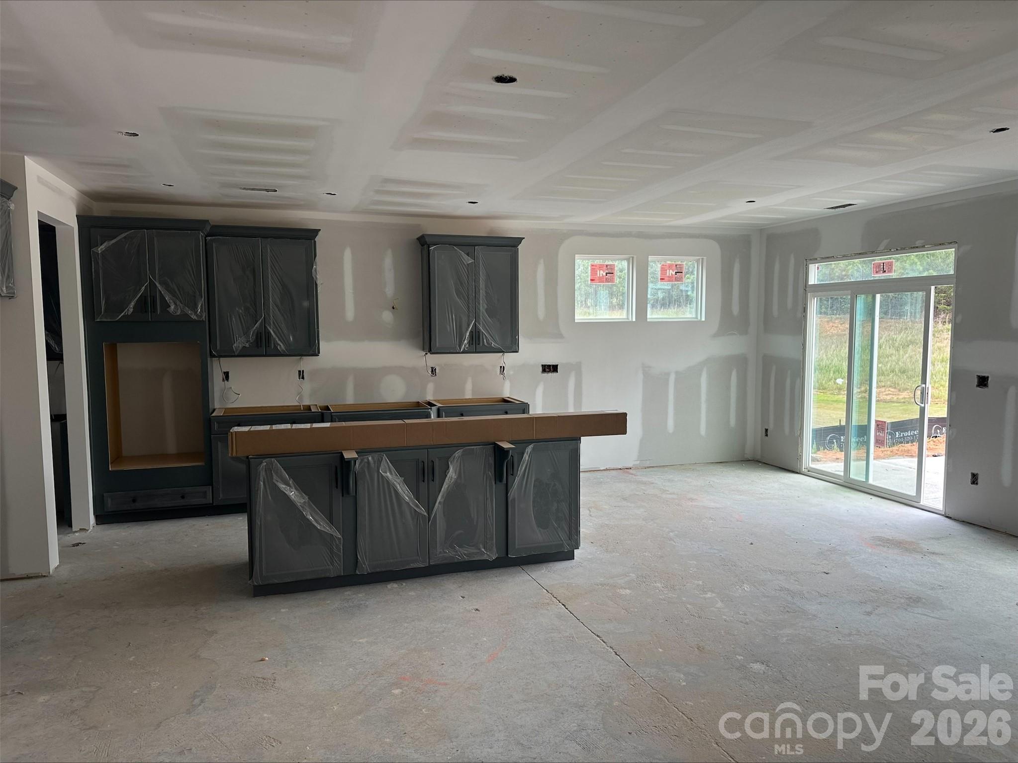 2229 Tabor Road Sherrills Ford, NC 28673 - Photo 3 of 8 a living room with stainless steel appliances kitchen island granite countertop a sink and cabinets