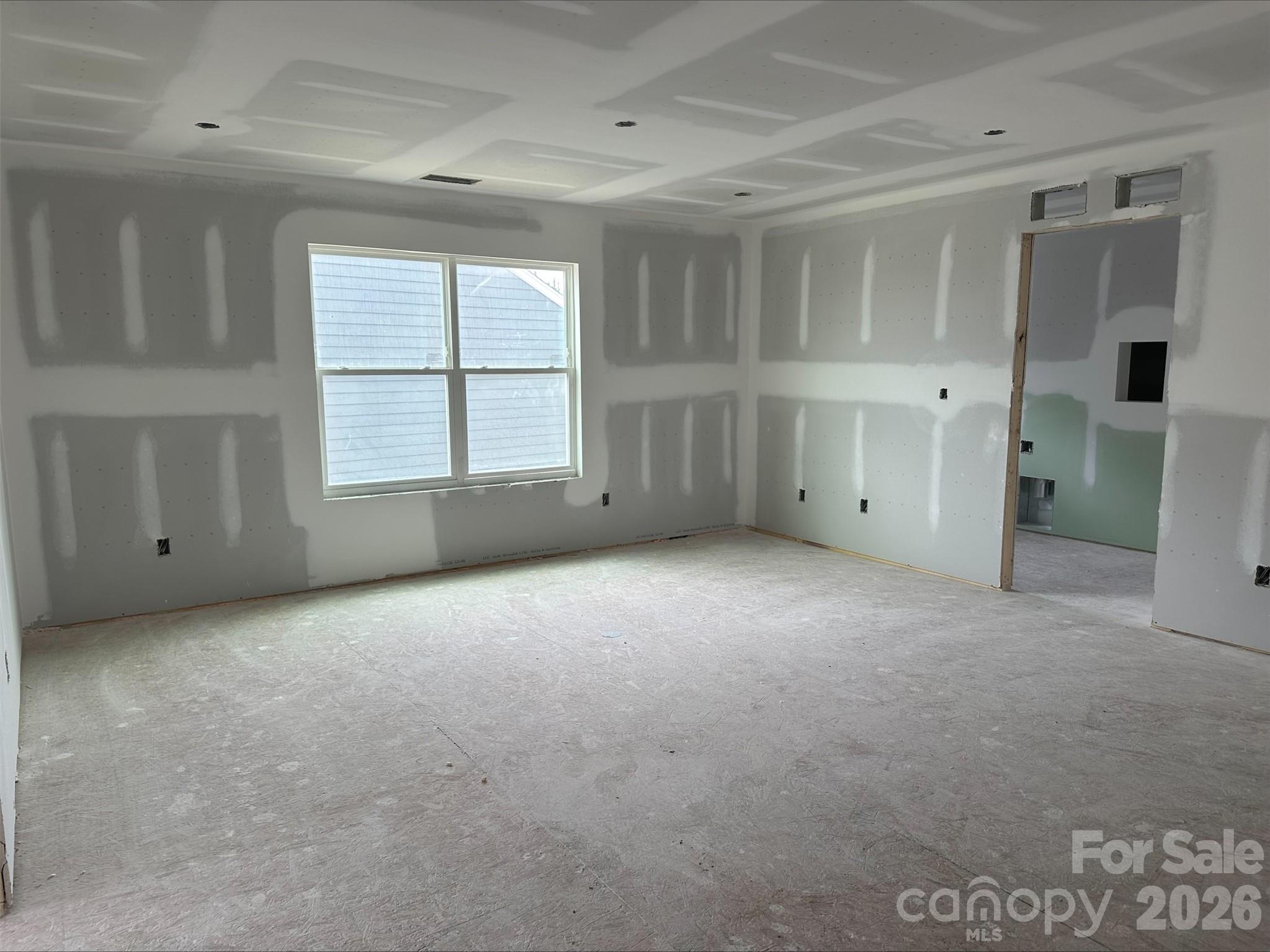 2229 Tabor Road Sherrills Ford, NC 28673 - Photo 4 of 8 an empty room with windows and closet