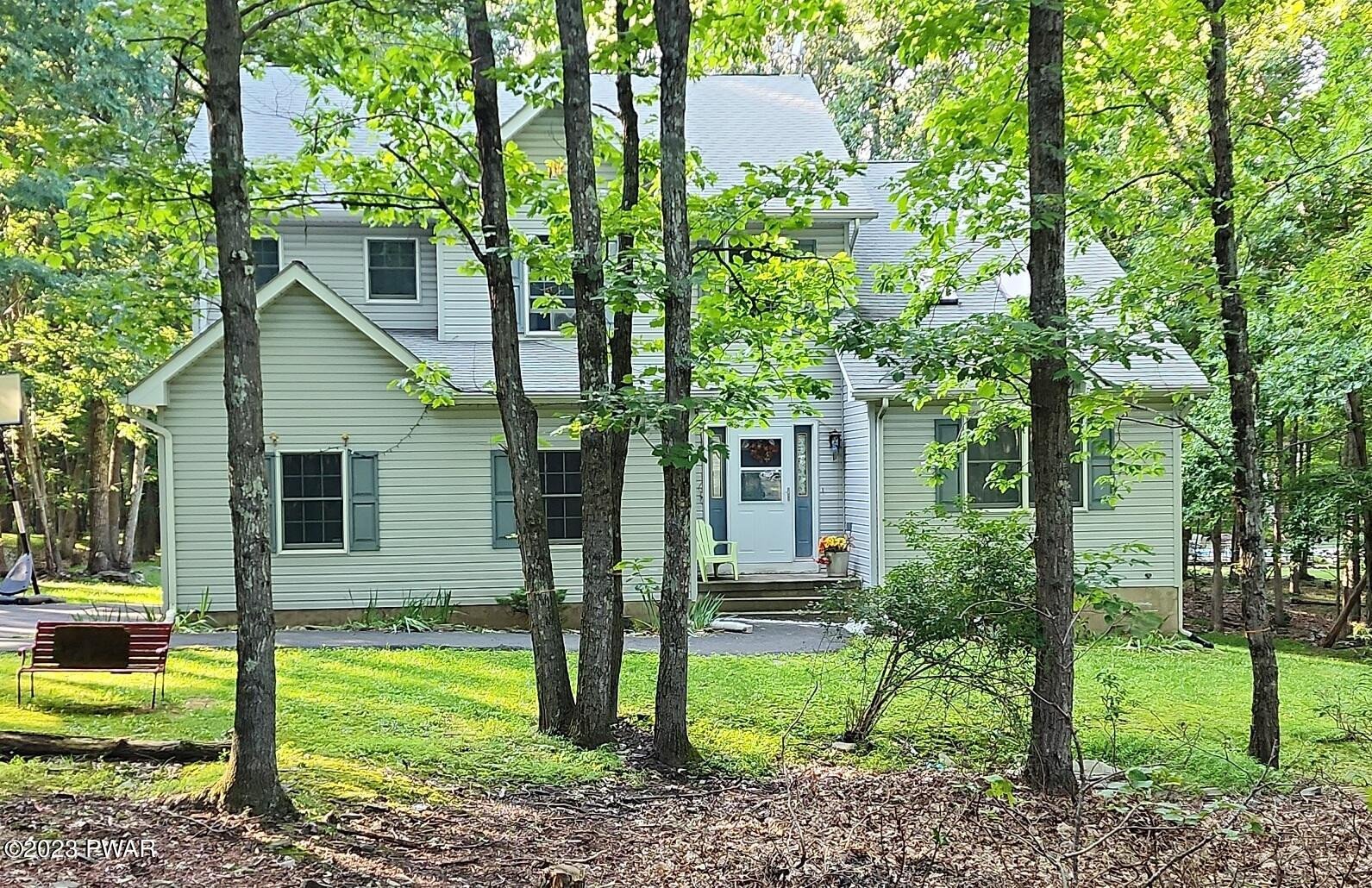 249 Pin Oak Road Stroudsburg, PA 18360 - Photo 1 of 34 a view of a house with backyard and a tree