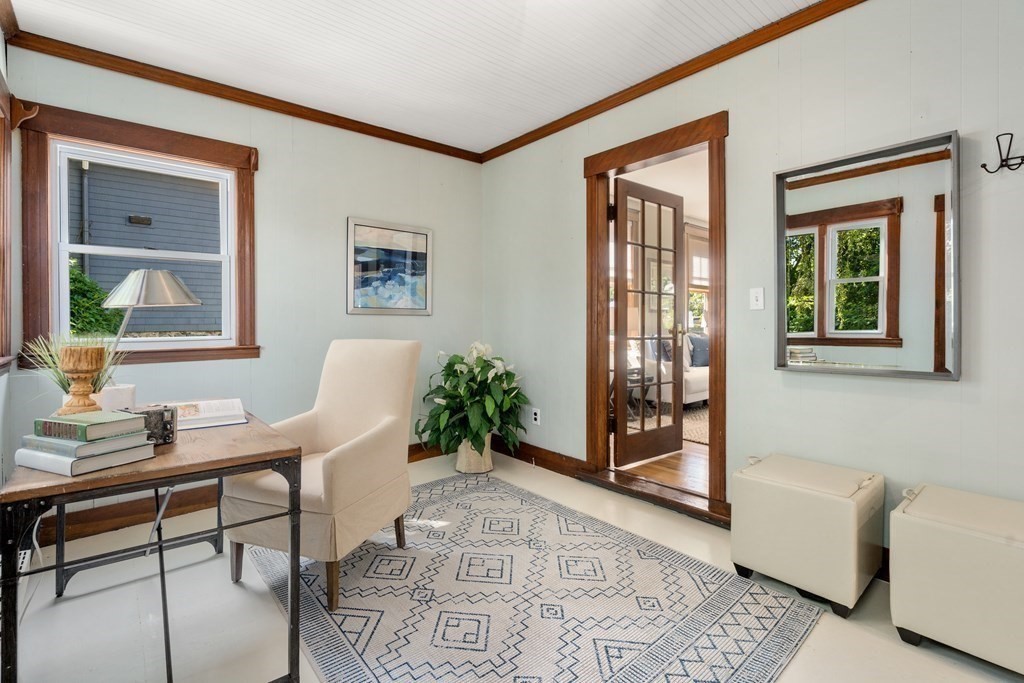 98 Hillside Avenue Arlington, MA 02476 - Photo 16 of 36 a workspace with furniture window and wooden floor
