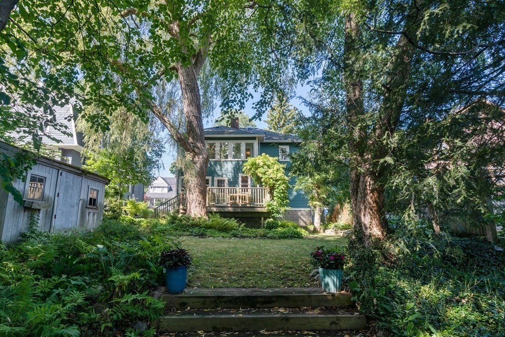 98 Hillside Avenue Arlington, MA 02476 - Photo 33 of 36 a front view of a house with a yard