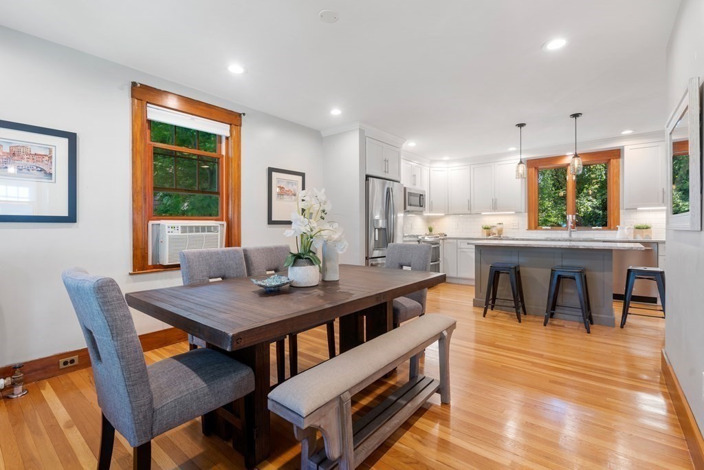 98 Hillside Avenue Arlington, MA 02476 - Photo 7 of 36 a view of a dining room with furniture window and outside view