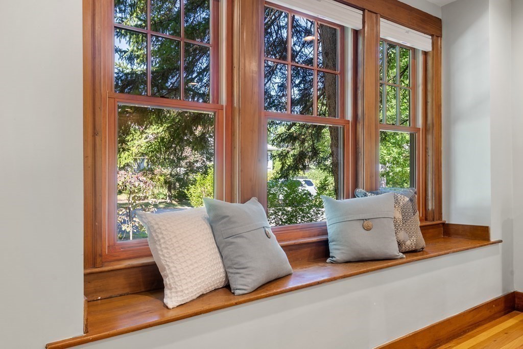 98 Hillside Avenue Arlington, MA 02476 - Photo 9 of 36 a living room with furniture and a window