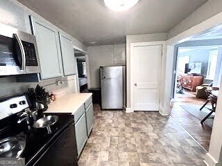 601 Heard Augusta, GA 30904 - Photo 11 of 51 a kitchen with a sink appliances and cabinets