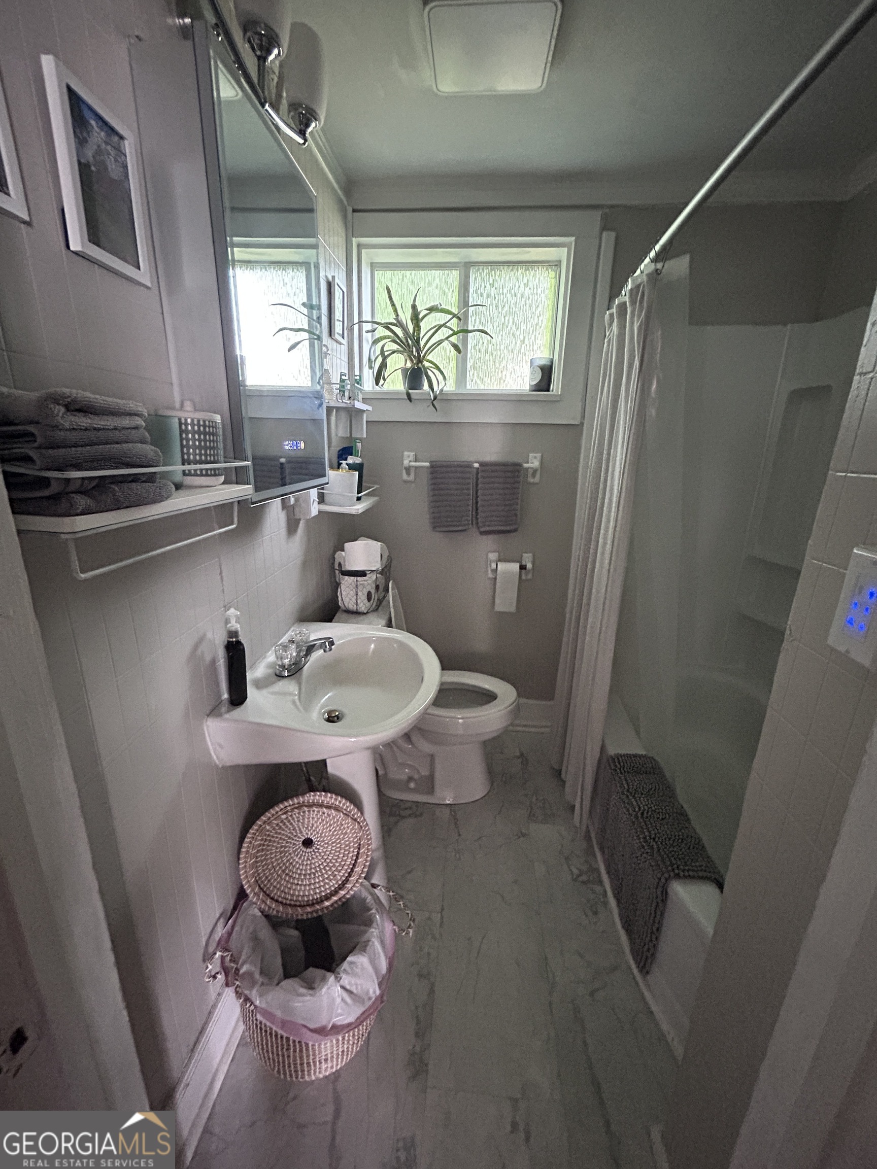 601 Heard Augusta, GA 30904 - Photo 51 of 51 a bathroom with a sink a toilet and a mirror