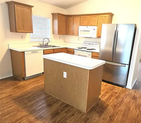 a room with wooden cabinets