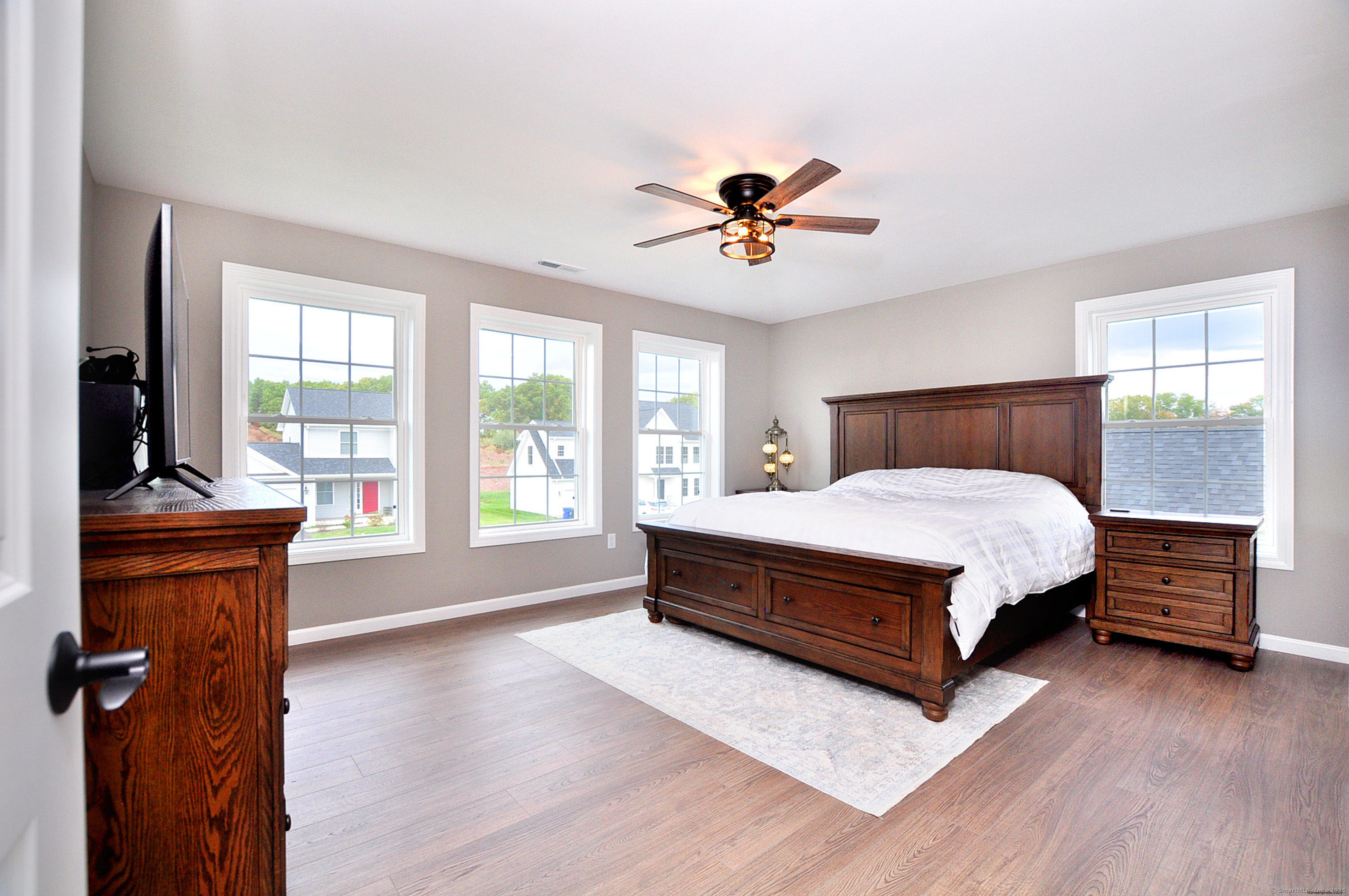 34 West River Road East Windsor, CT 06088 - Photo 21 of 31 a bedroom with a large bed and a window