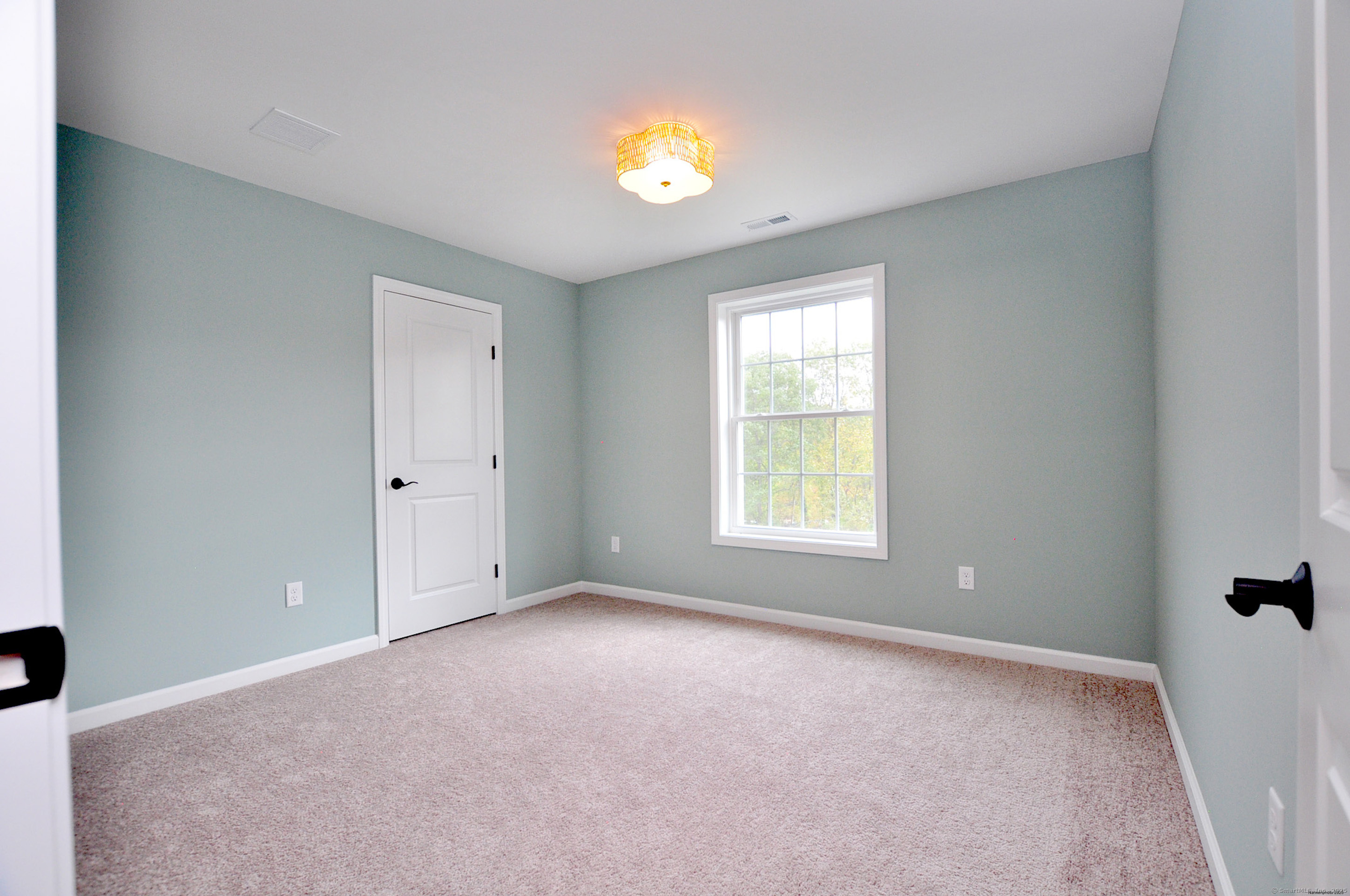 34 West River Road East Windsor, CT 06088 - Photo 26 of 31 a view of an empty room with a window and outside view