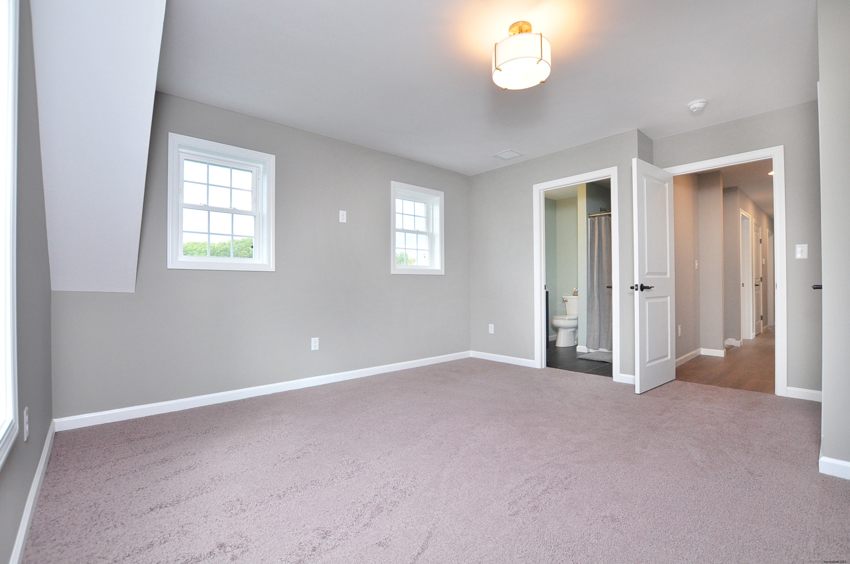 34 West River Road East Windsor, CT 06088 - Photo 28 of 31 an empty room with windows and closet