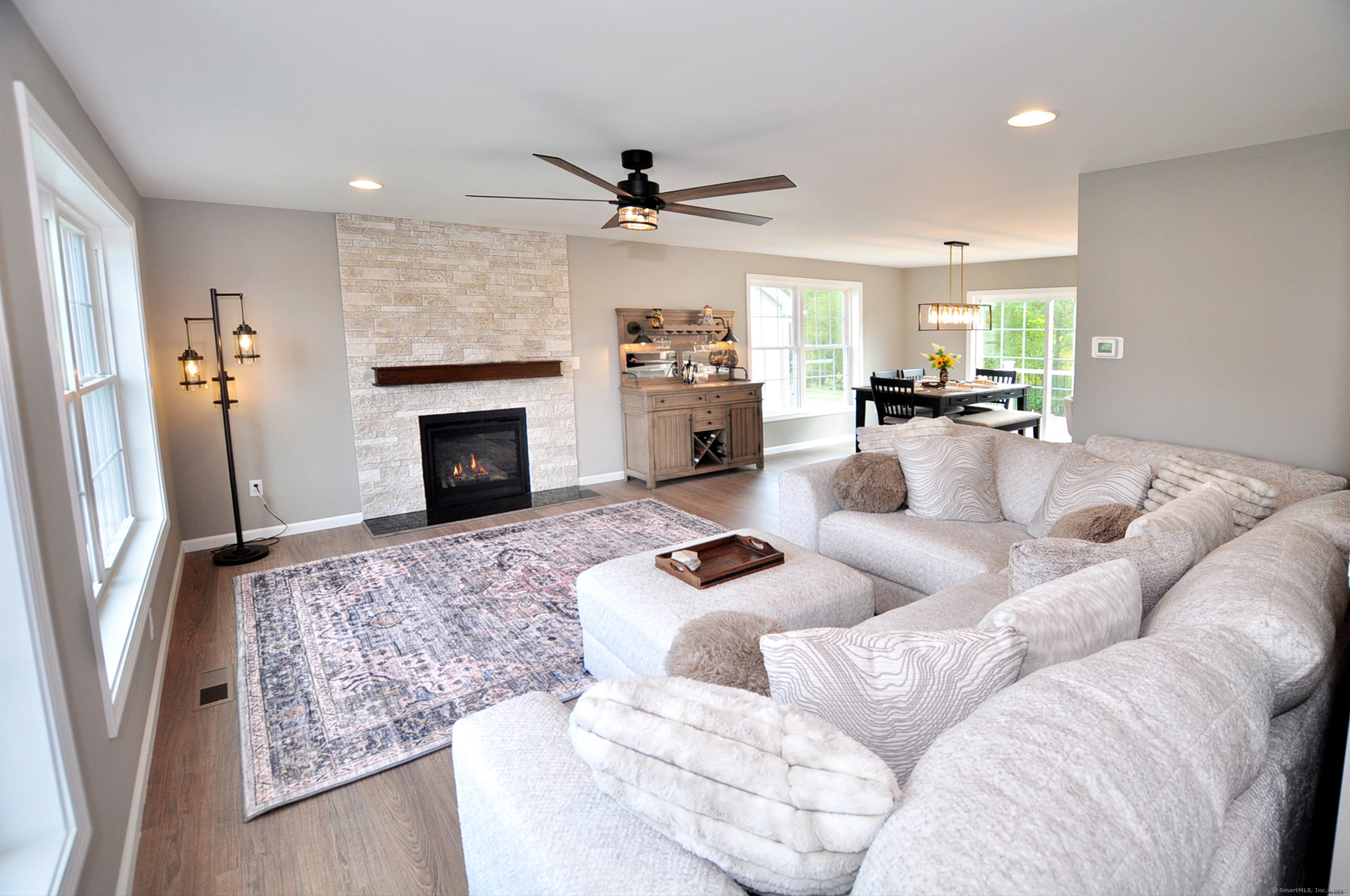 34 West River Road East Windsor, CT 06088 - Photo 7 of 31 a living room with furniture fireplace and a flat screen tv