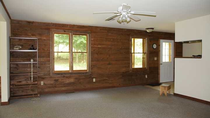 335 Barton Spur Road Ferrum, VA 24088 - Photo 4 of 18 a view of an empty room with a window