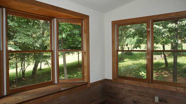 335 Barton Spur Road Ferrum, VA 24088 - Photo 5 of 18 a view of a room that has a bed and wooden floor