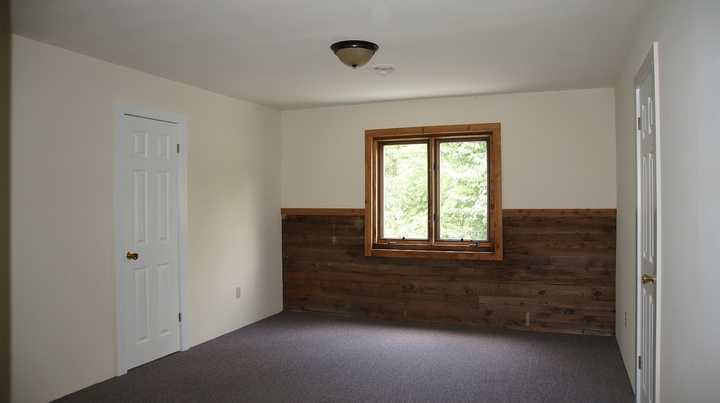 335 Barton Spur Road Ferrum, VA 24088 - Photo 9 of 18 a view of an empty room with a window