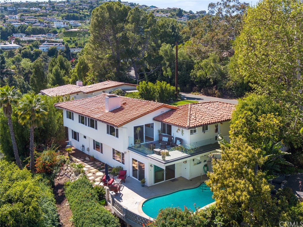 6248 Via Canada Rancho Palos Verdes, CA 90275 - Photo 1 of 1 an aerial view of a house with a big yard and large trees