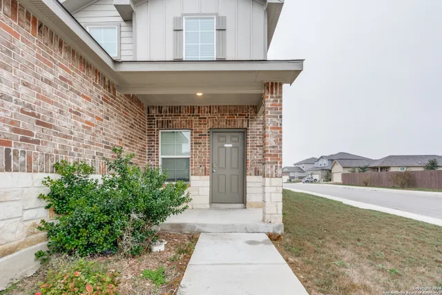 a view of a house with a garden