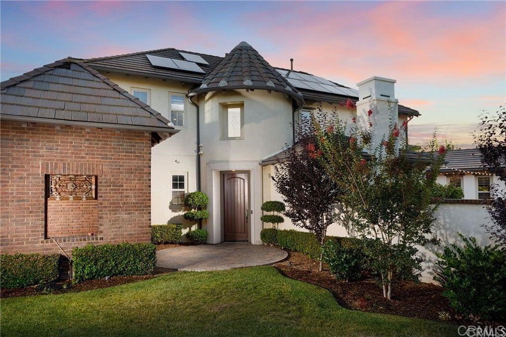 5 David Street Ladera Ranch, CA 92694 - Photo 2 of 22 a front view of a house with a garden