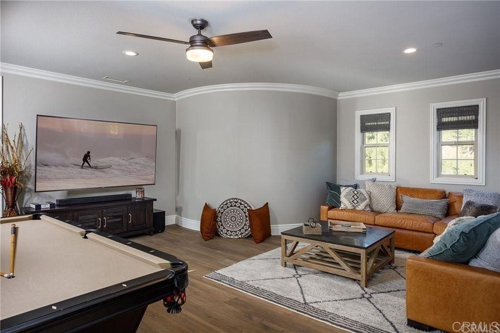 5 David Street Ladera Ranch, CA 92694 - Photo 13 of 22 a living room with furniture and a flat screen tv