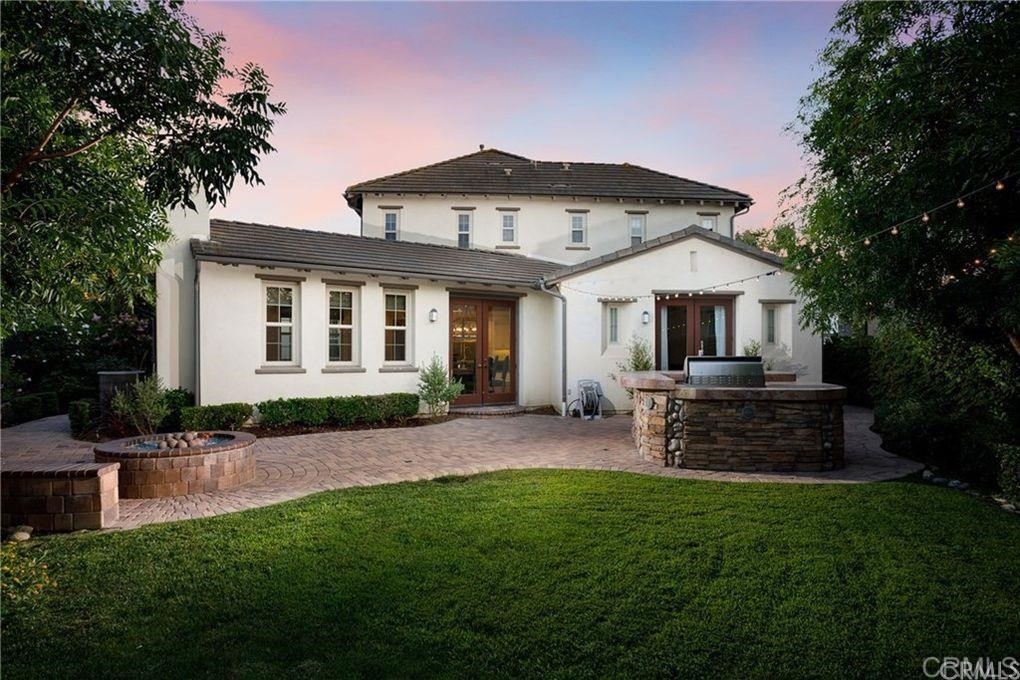 5 David Street Ladera Ranch, CA 92694 - Photo 18 of 22 a front view of a house with a garden