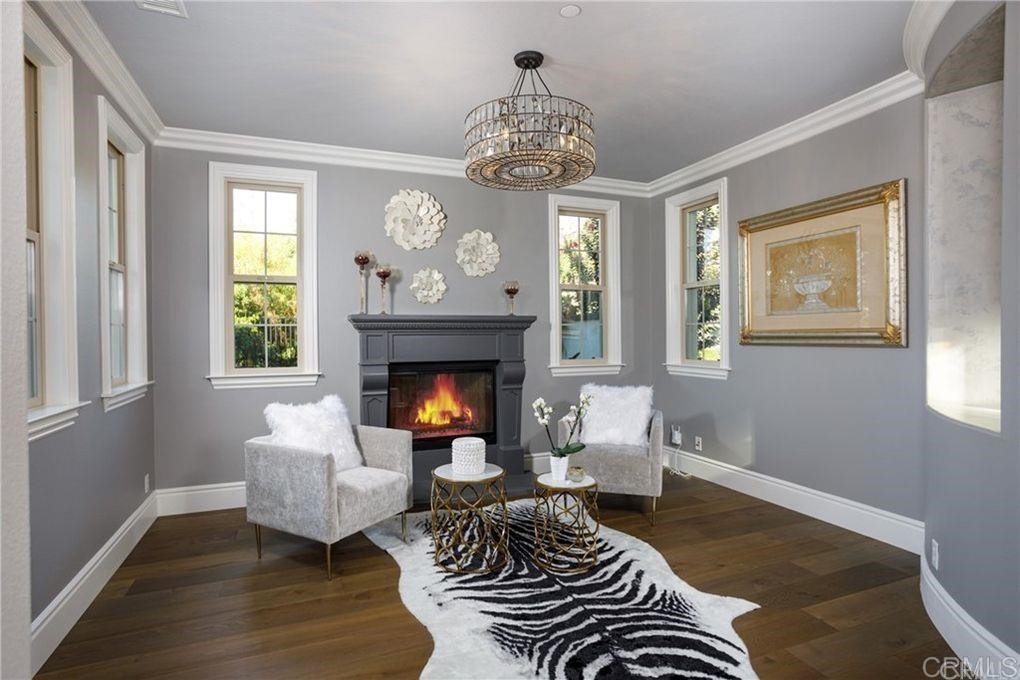 5 David Street Ladera Ranch, CA 92694 - Photo 4 of 22 a bedroom with furniture and a fireplace