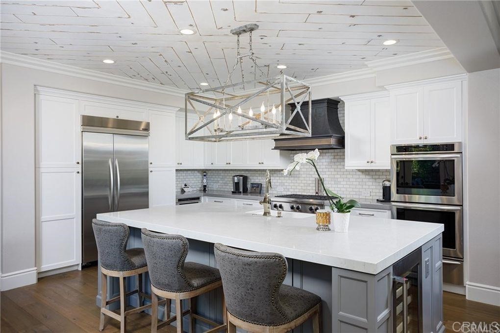 5 David Street Ladera Ranch, CA 92694 - Photo 6 of 22 a kitchen with stainless steel appliances a sink and cabinets