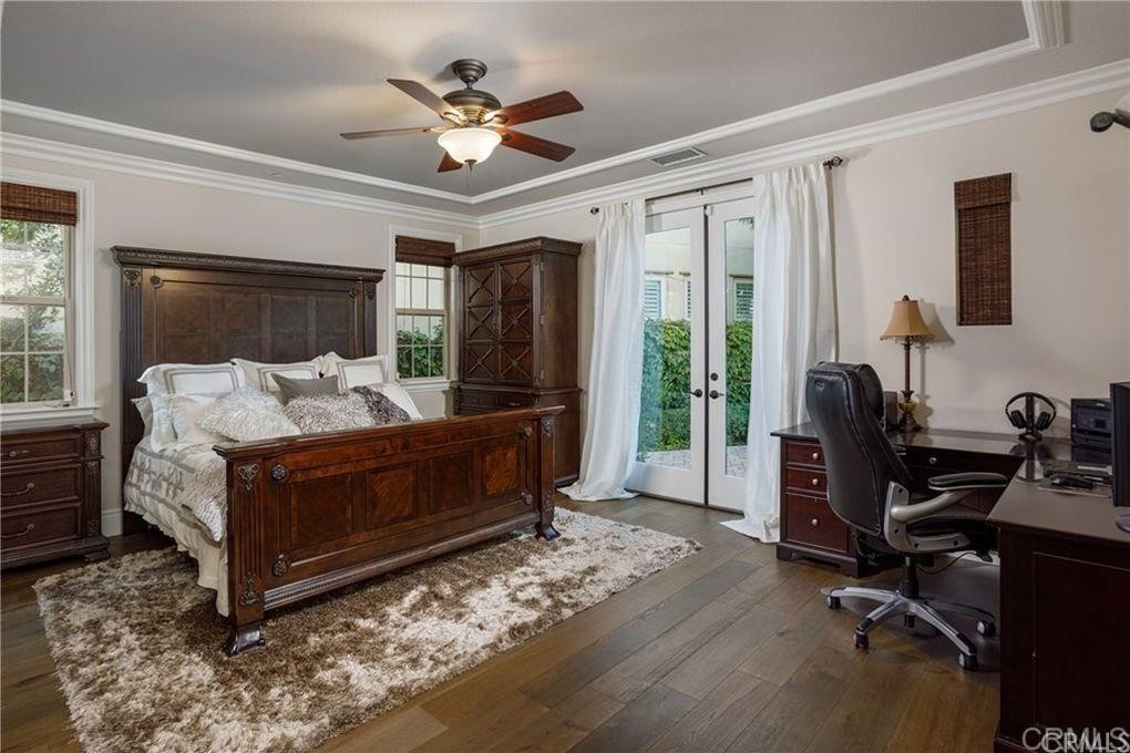 5 David Street Ladera Ranch, CA 92694 - Photo 9 of 22 a bedroom with a bed and wooden floor