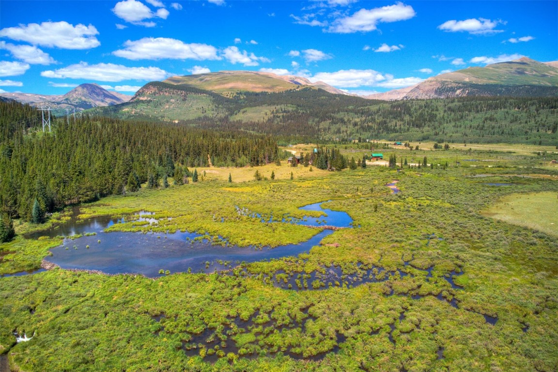 412 Kootchie Kootchie Road Alma, CO 80420 - Photo 2 of 9 a view of a lake with a mountain