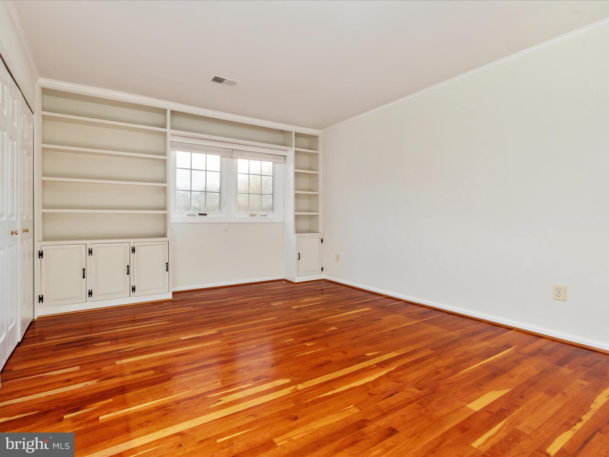 11922 Blue Spruce Road Reston, VA 20191 - Photo 20 of 65 a view of empty room with wooden floor