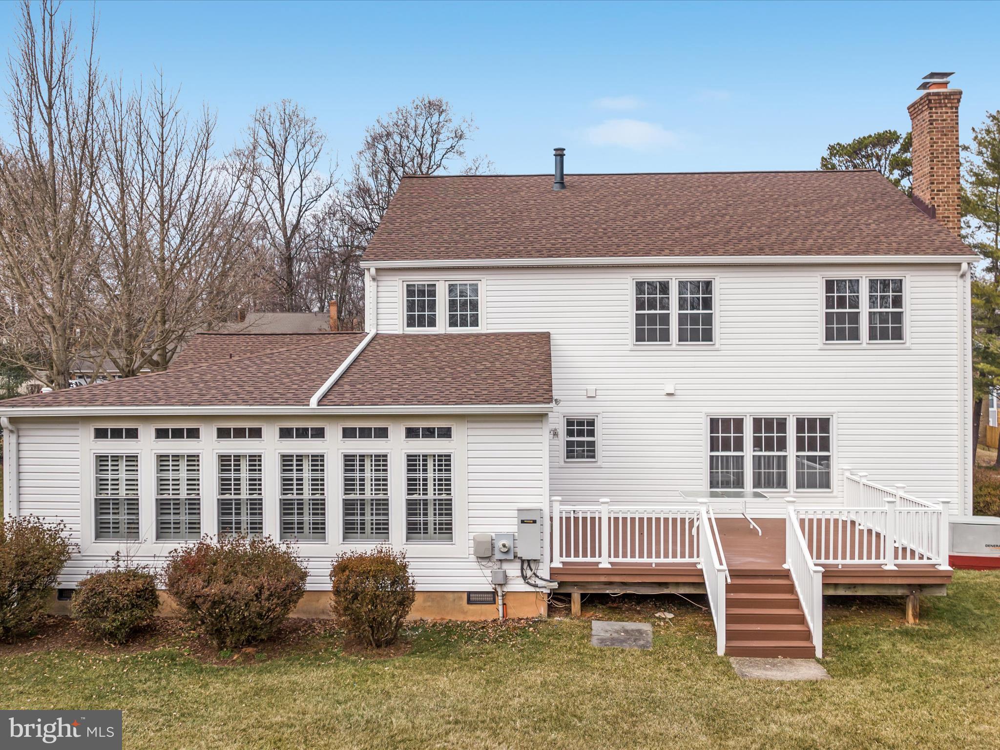 11922 Blue Spruce Road Reston, VA 20191 - Photo 46 of 65 a front view of a house with a yard