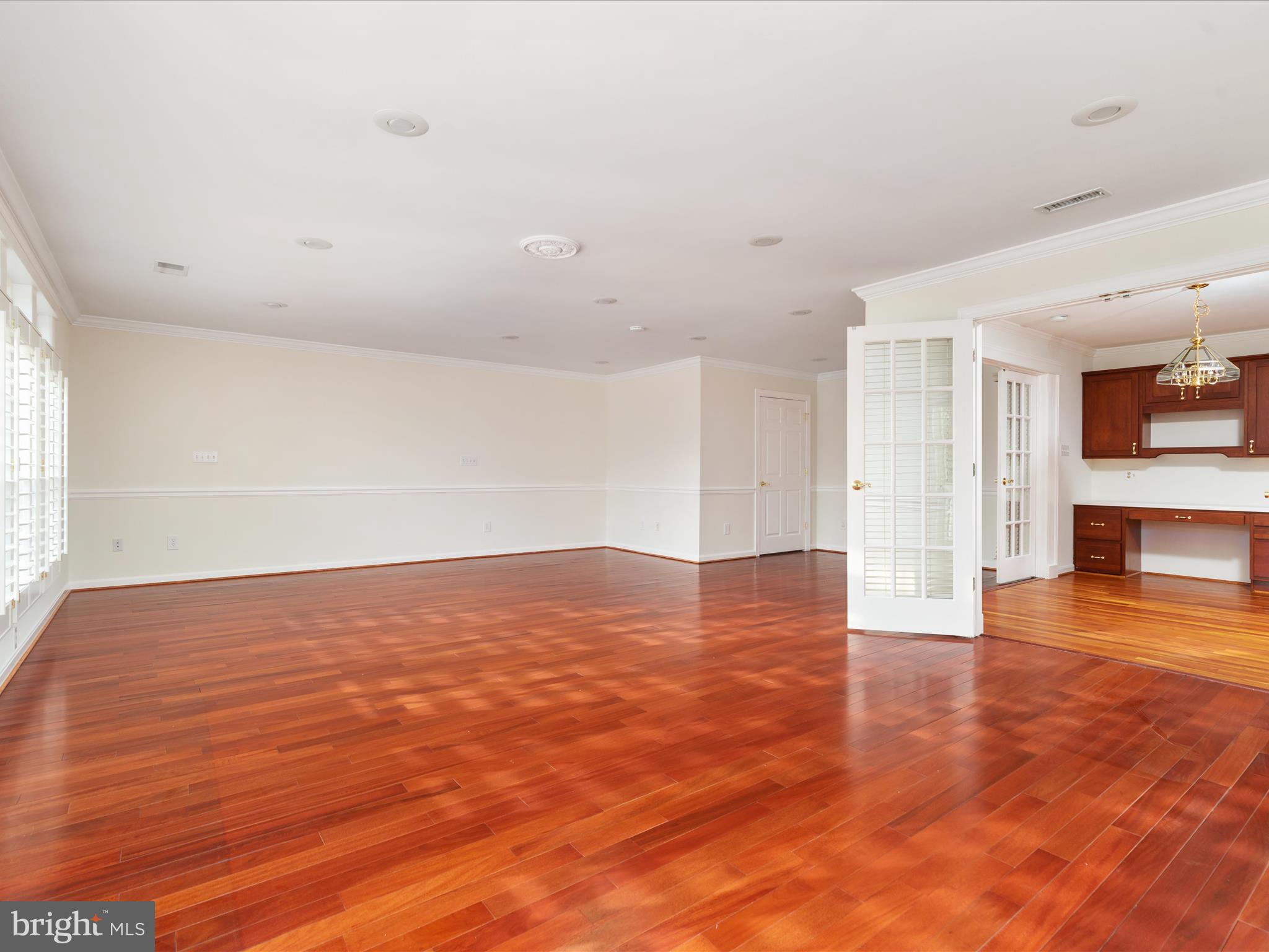 11922 Blue Spruce Road Reston, VA 20191 - Photo 10 of 65 a view of empty room with wooden floor