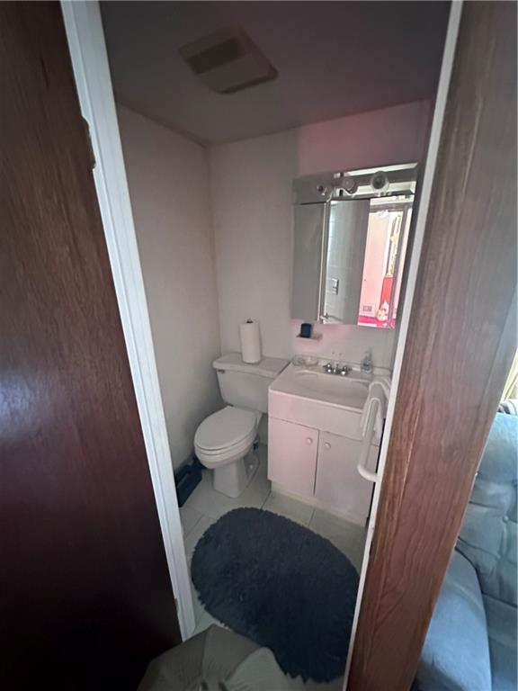 5323 Broad Street Pittsburgh, PA 15224 - Photo 20 of 38 a bathroom with a sink and a toilet