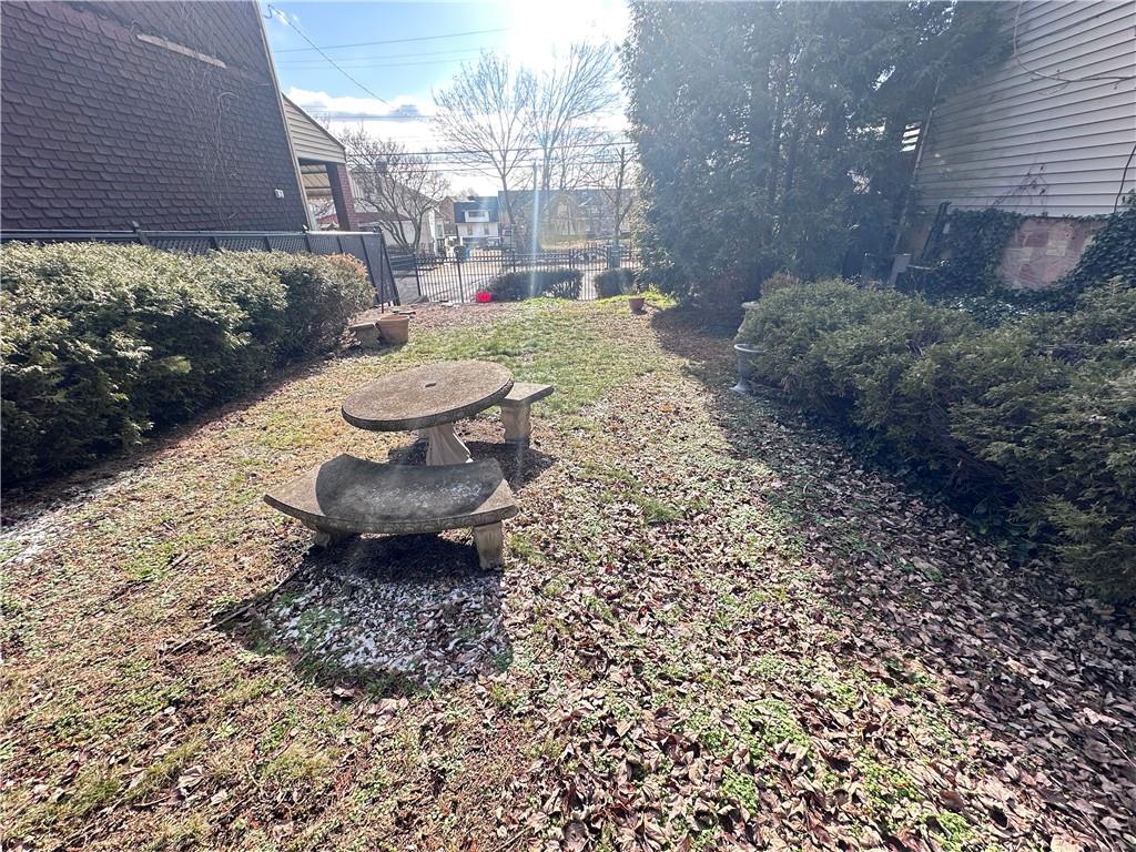 5323 Broad Street Pittsburgh, PA 15224 - Photo 27 of 38 a view of a backyard with table and chairs and potted plants