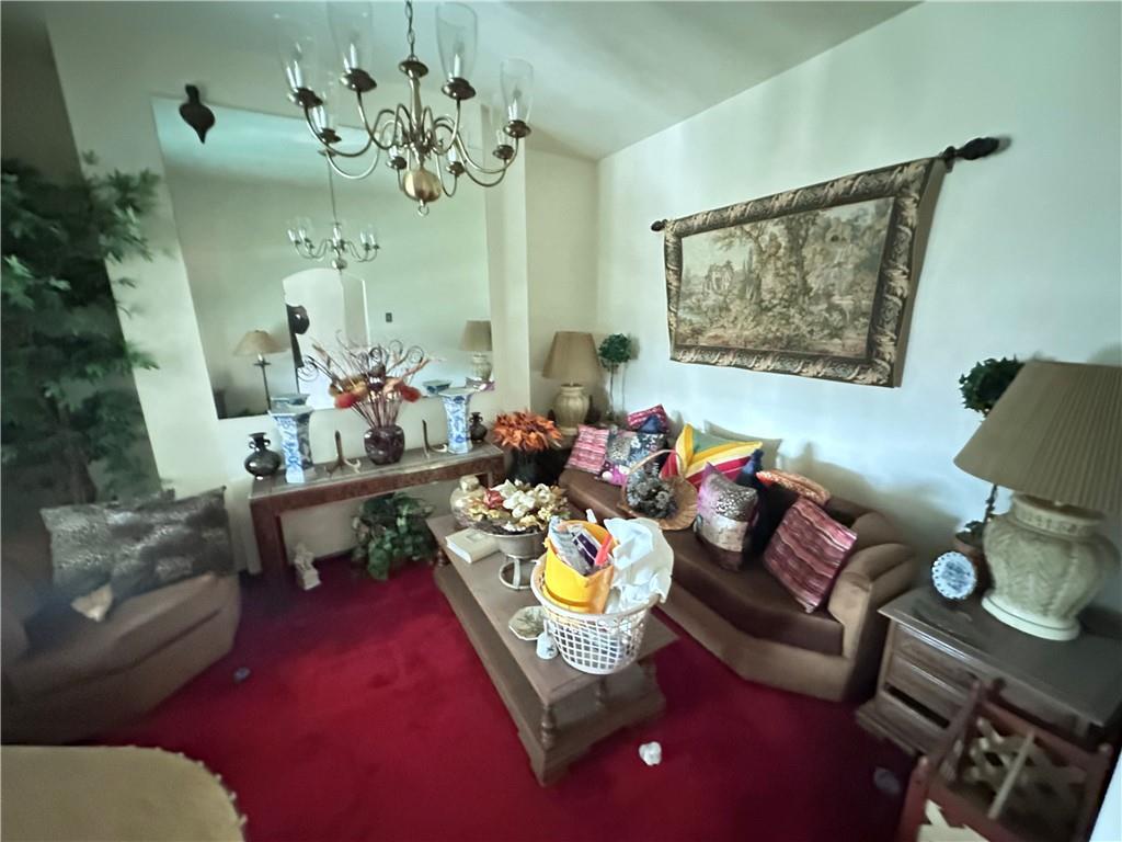 5323 Broad Street Pittsburgh, PA 15224 - Photo 6 of 38 a living room with furniture and a chandelier